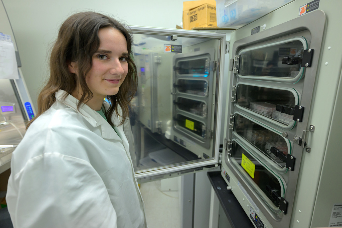 Scientist reviewing clinical trial data in a research laboratory